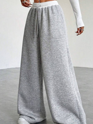 Стильные палаццо с белым поясом DMP-A7229T300