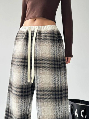 Oversize брючки в клетку DMP-A7107T300